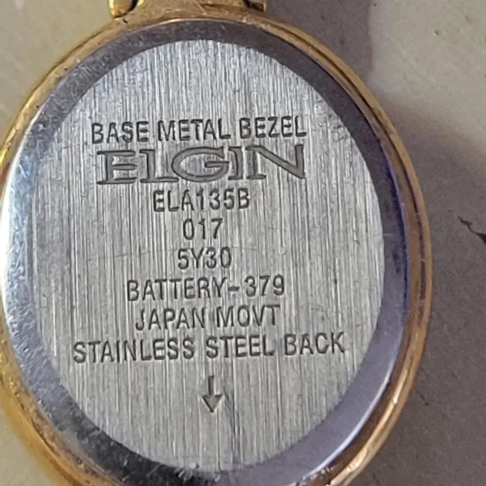 Elgin Ladies  Designer Watch Gold Tone 6 1/2 inches long‎ bracelet new battery